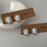 Elegantes pendientes de perlas de Carmen